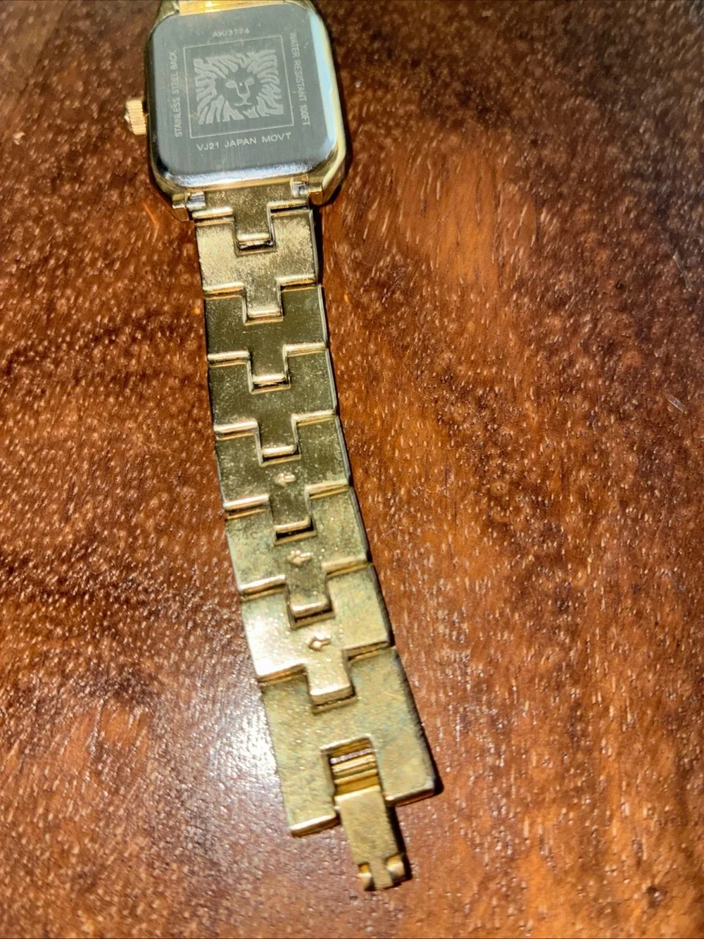 Anne Klein Gold and Black Rectangular Bracelet Watch